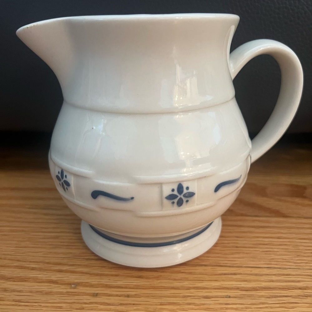 - Longaberger pottery pitcher